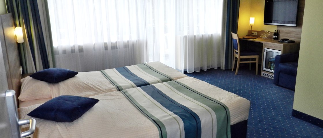 Eines der gem&uuml;tlichen Hotelzimmer, &copy; Hotel Schlossblick